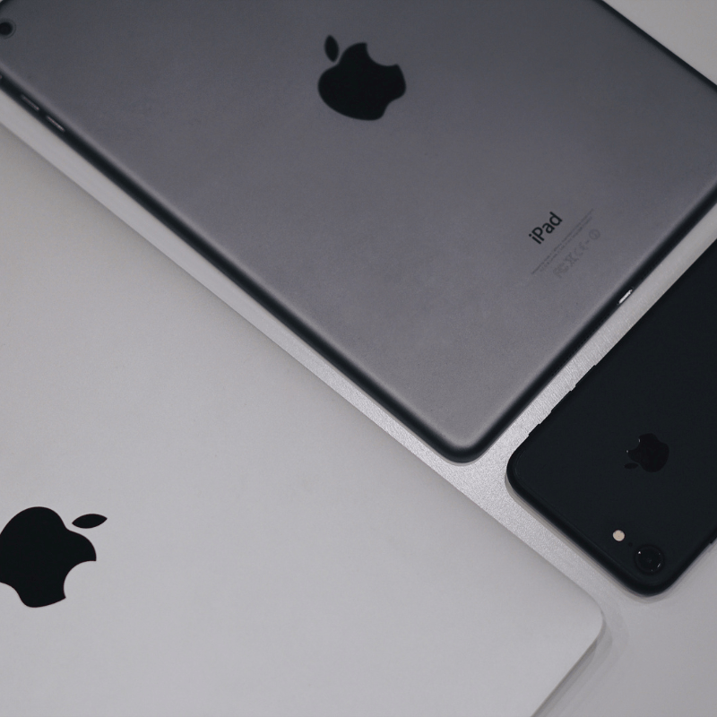 Apple devices on a desk for the CompuTech blog.
